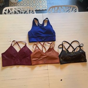 4 worn sports bras, padded